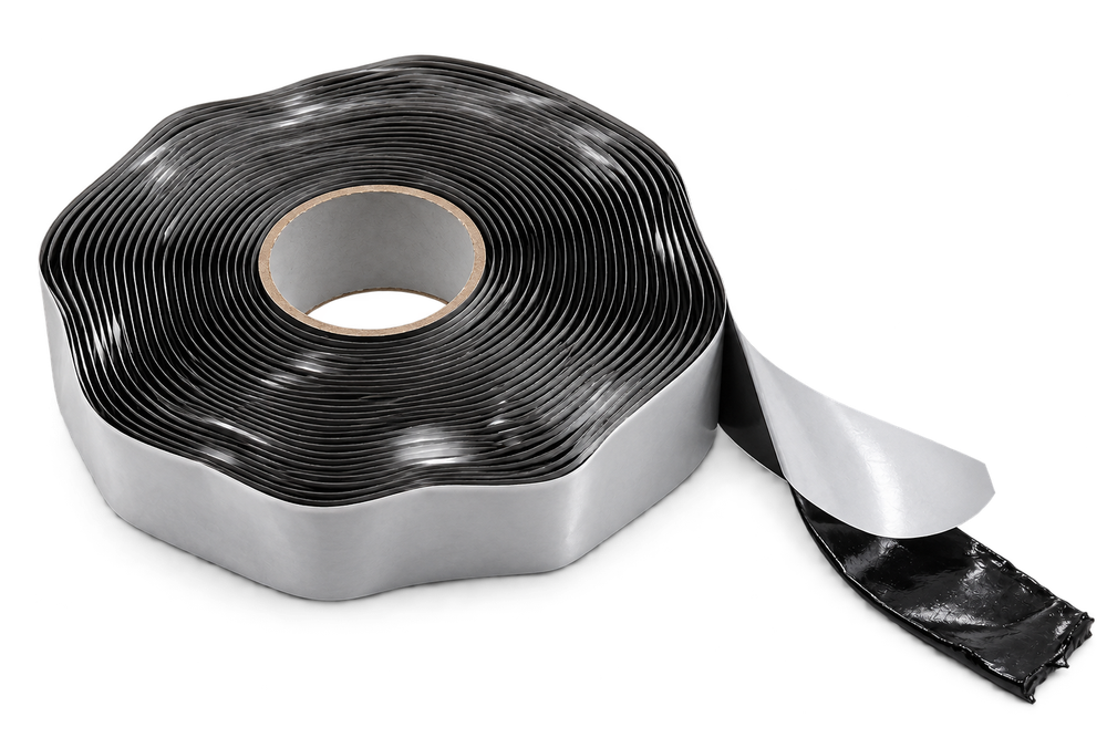 Roll of black butyl rubber mastic with release paper peeled back – YTM Makina